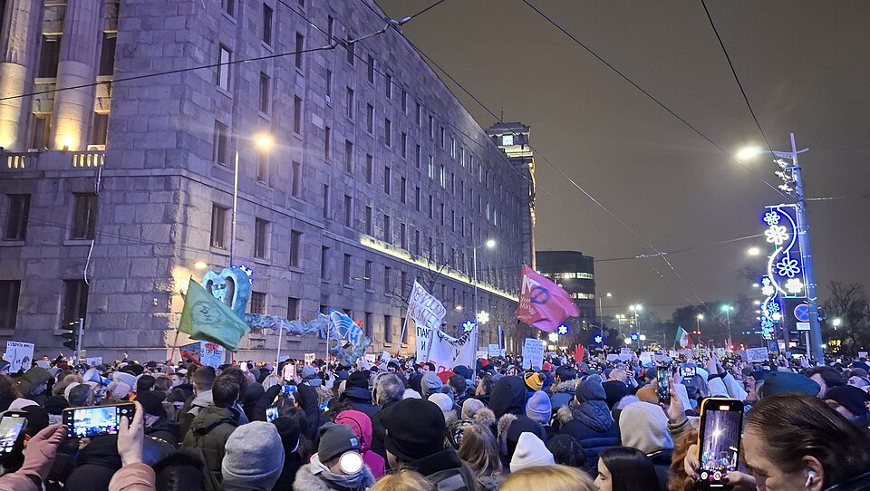 Anti-corruption protest in Belgrade 17 January, crowd outside a building.